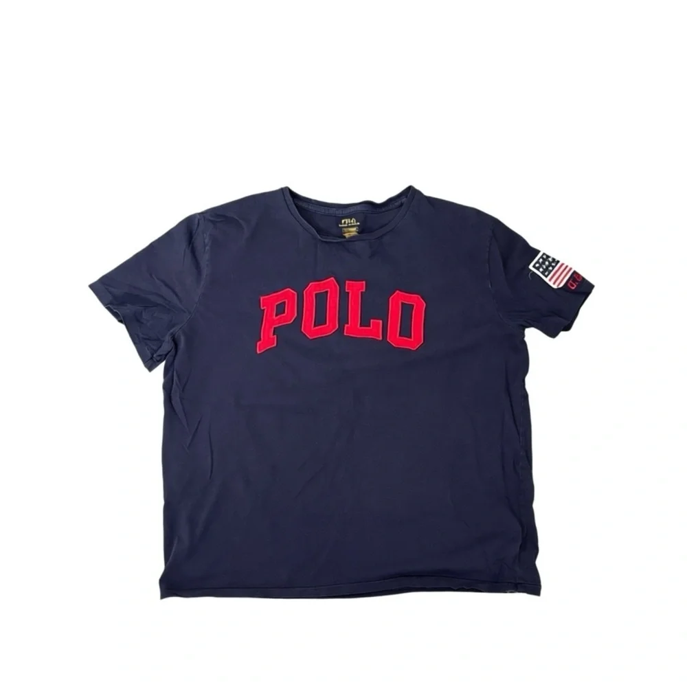 🇺🇸 Classic POLO Tee – Bold Logo + USA Flag Sleeve | 90’s Cool Staple